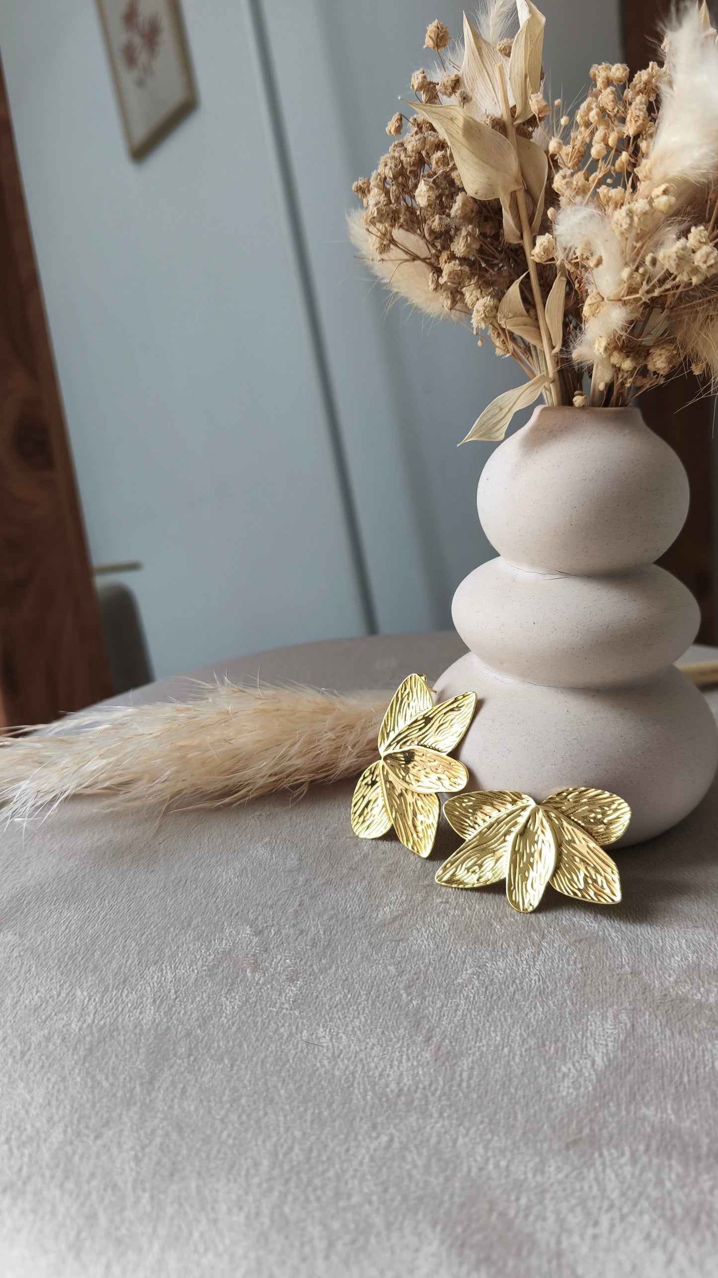 Les Boucles en acier inoxydables "Laurier"